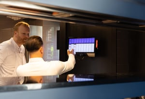 Restaurant staff using the Annoncer Kitchen Management System during service